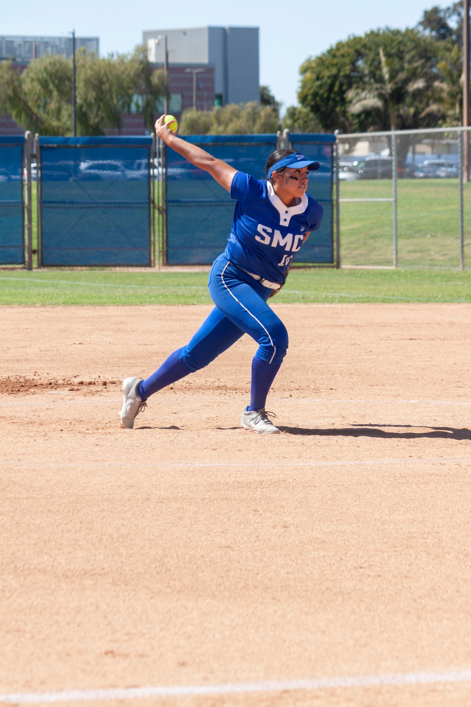 SMC Pitcher winds up to deliver a pitch against Oxnard.