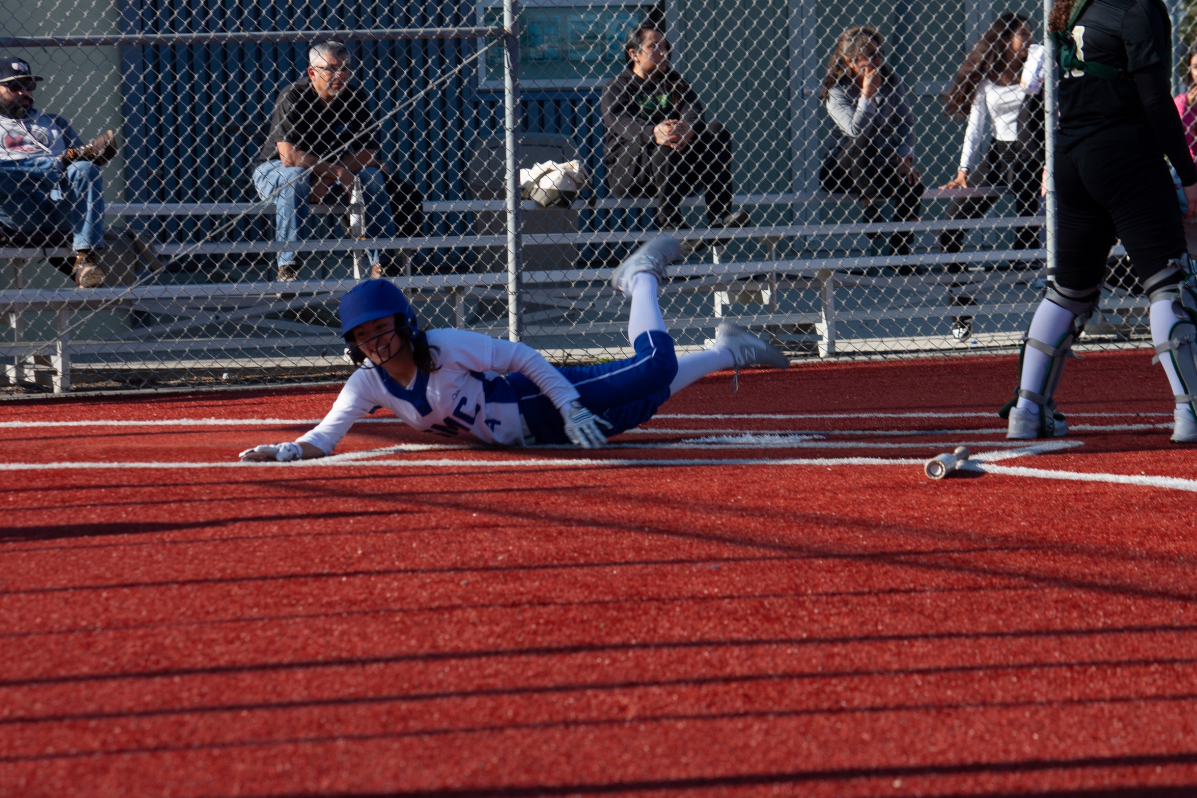 SMC Baserunner slides headfirst into home